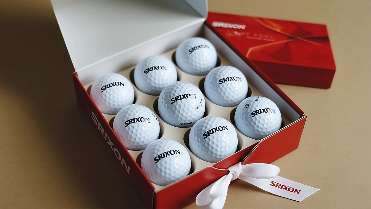 Srixon Soft Feel Lady Golf Balls in a box, showcasing the word "srixon" on the exterior design.