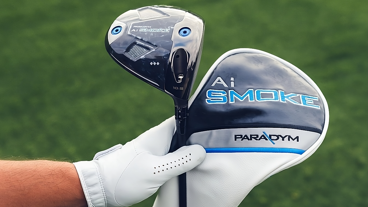 Callaway Paradym AI golf club featuring a smoke logo, held alongside its protective cover