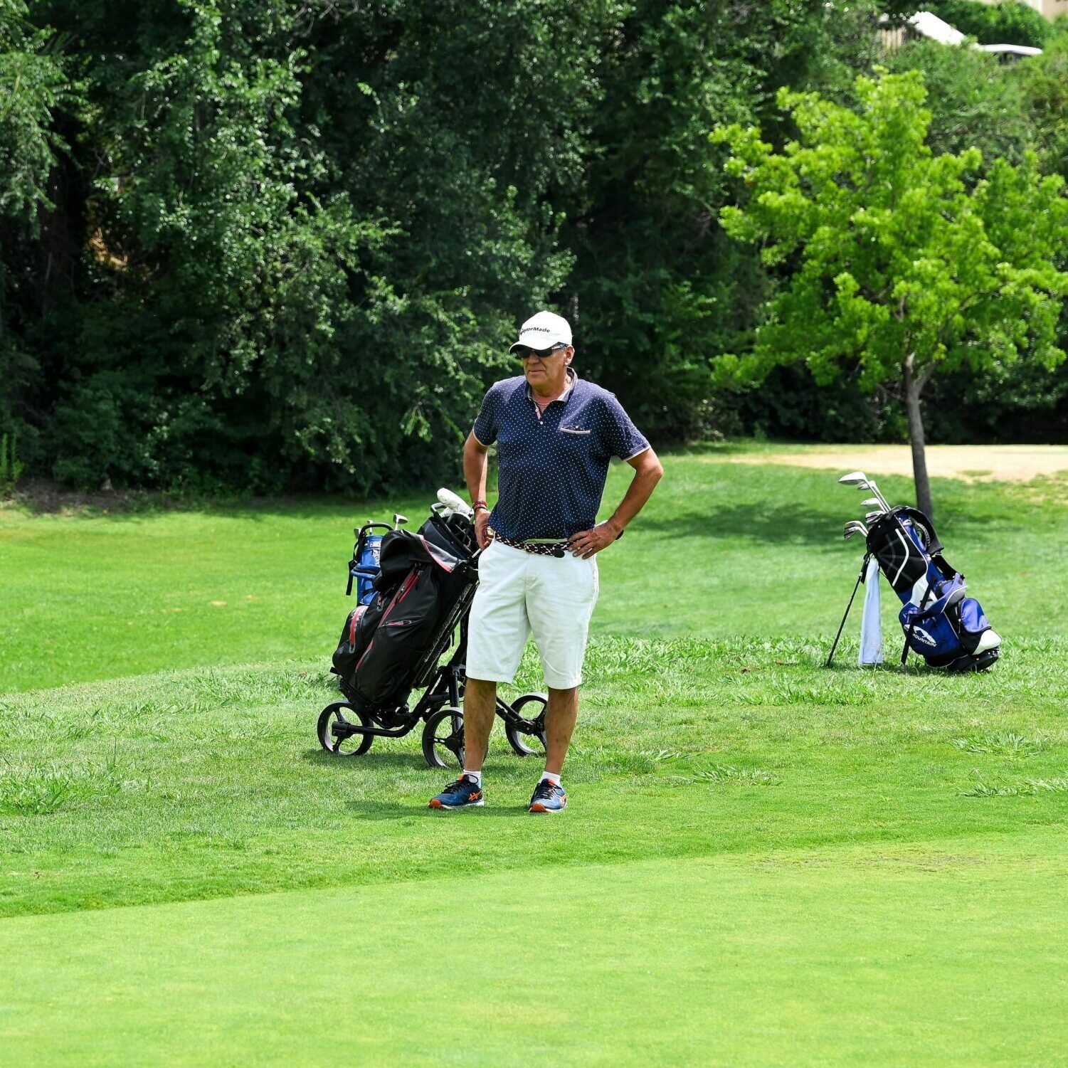 Man Playing Golf on a Field